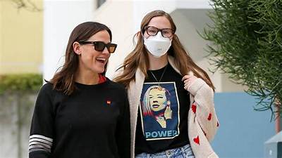 Unmasking the Reason: Why Does Violet Affleck Conceal Her Face?